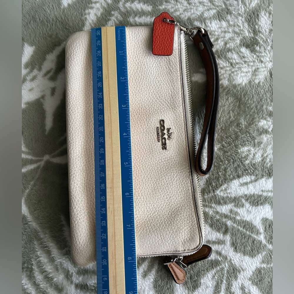 Coach White Pebbled Leather Wristlet with Coral Tag - Picture 3 of 13